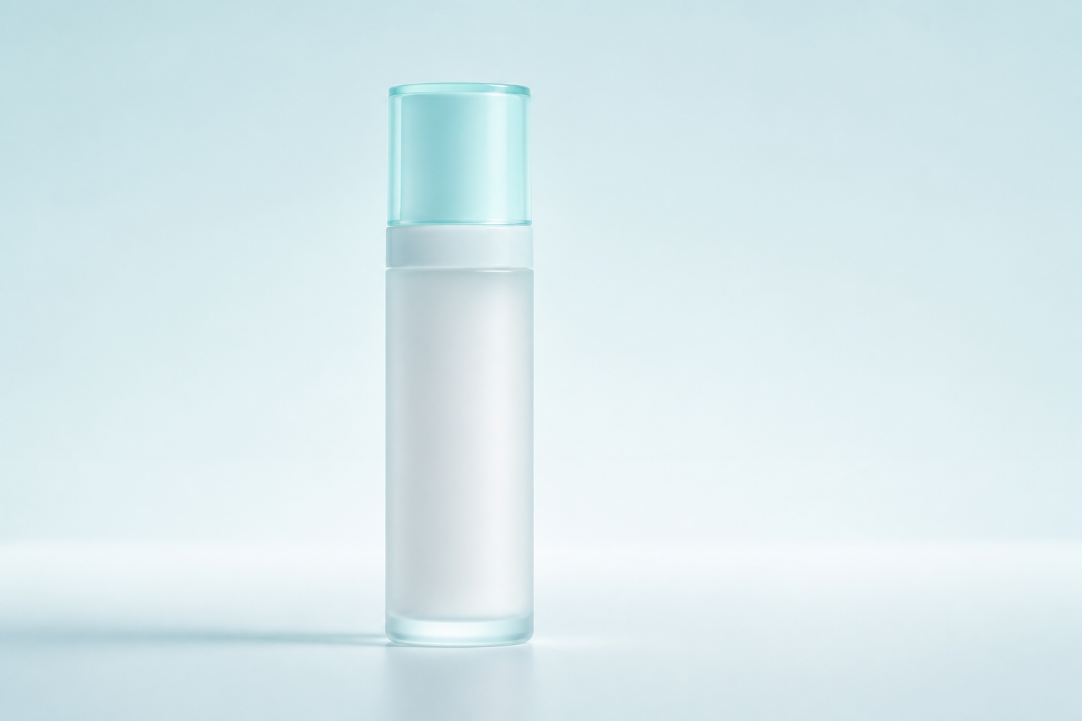 Unbranded milky-glass lotion bottle with its aqua cap closed